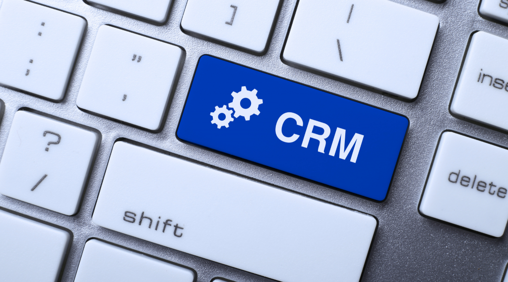 A computer keyboard has a CRM button. It relates to the blog post that encourages you to upgrade your CRM in January.